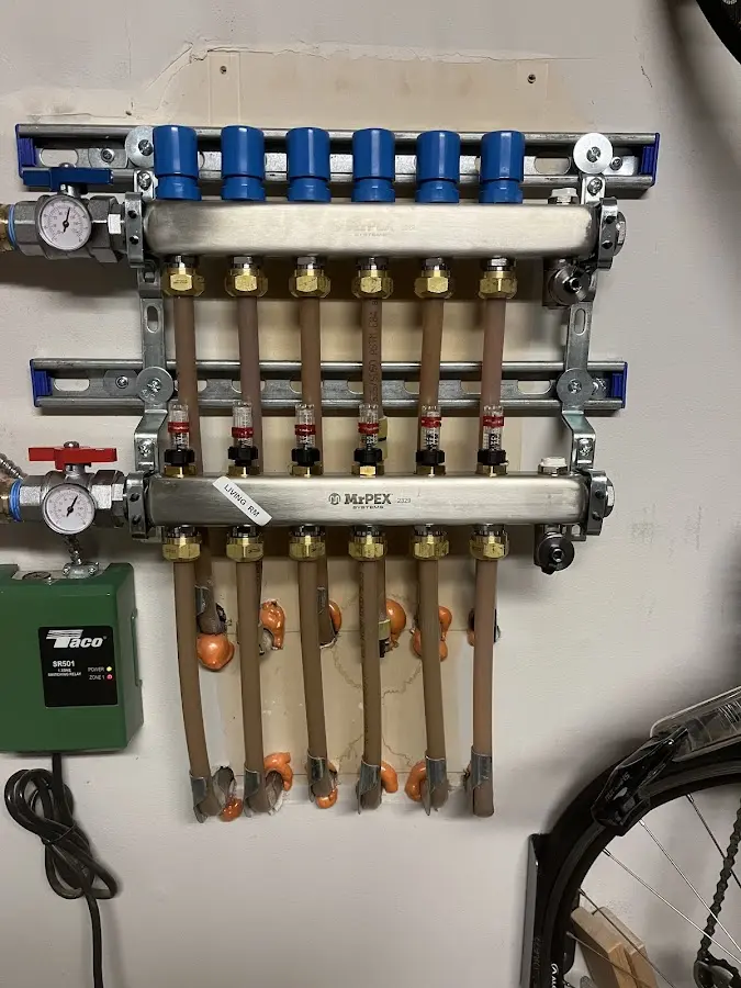 Plumber performing Gas Line Installation at a residential property in Garner